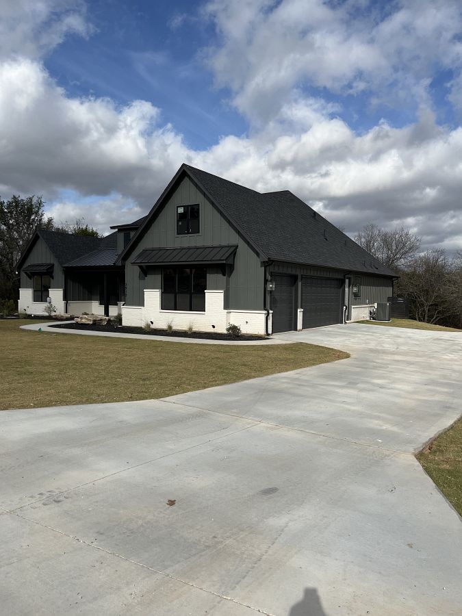 Concrete driveway and sidewalk by DRI Construction