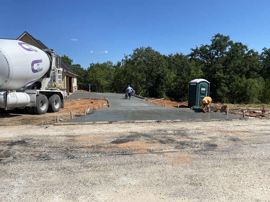 Concrete driveway finishing by DRI Construction