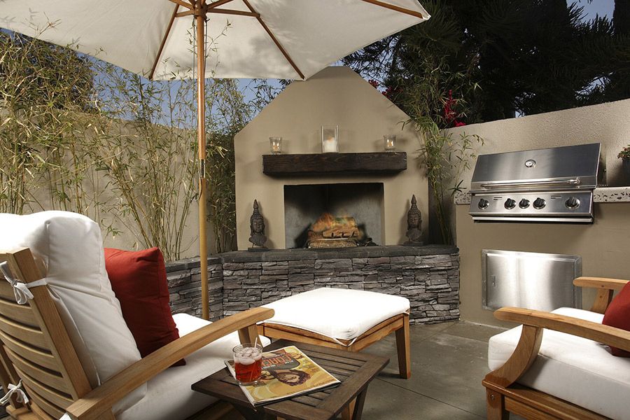 outdoor fireplace and kitchen