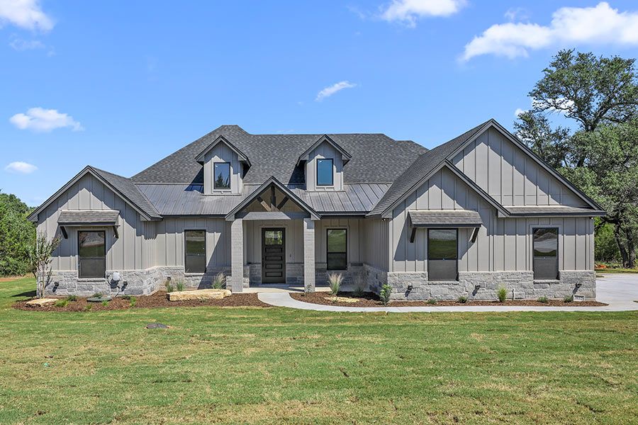 Shingle and metal roof installation by DRI Construction